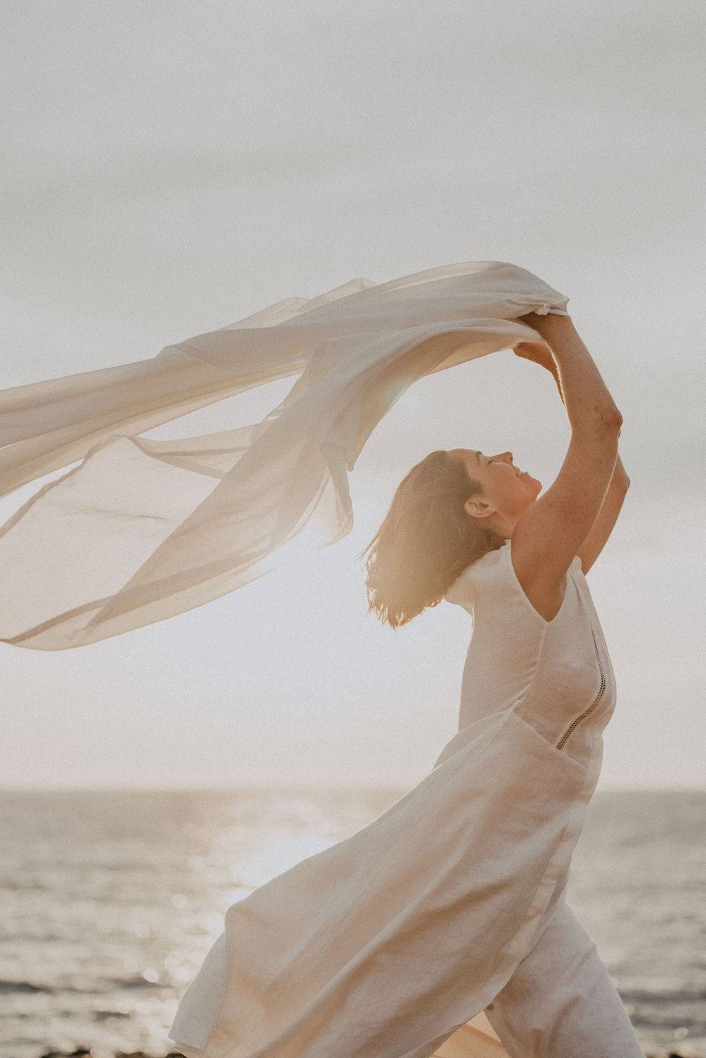 Promotional image for the Step Into Your Own Light online retreat, offered by Lizzie Lasater, a restorative yoga teacher with a thriving online yoga education business.